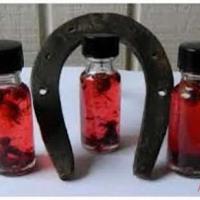 TRADITIONAL HEALER WITH SANDAWANA OIL AND SKIN