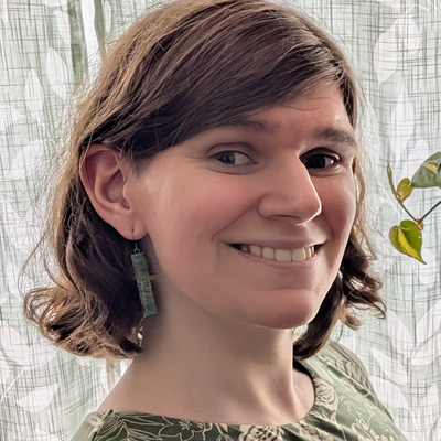 Robin Kay (She/They)